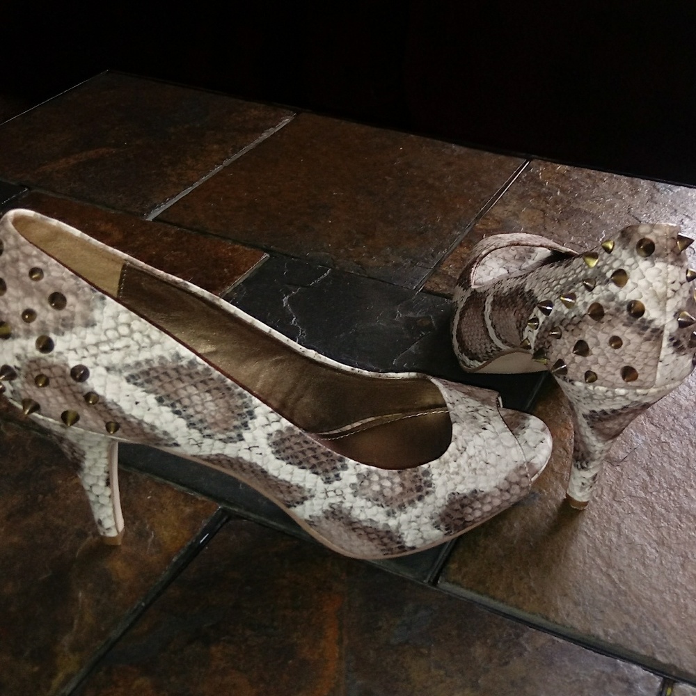 Fergalicious snake studded heels